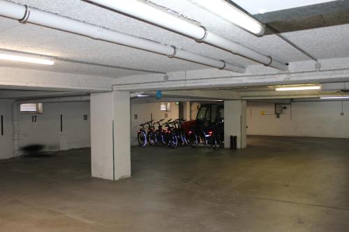 a parking lot with bikes parked in a parking garage at Lauenburger Mühle in Lauenburg