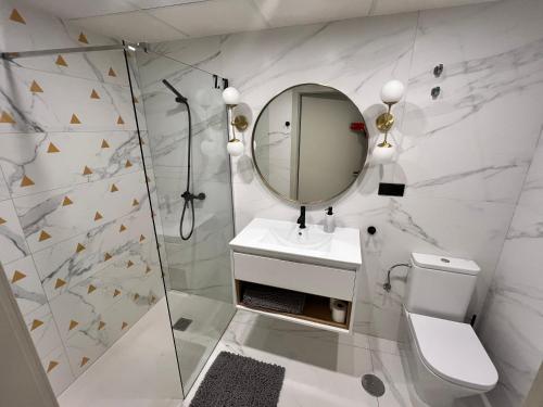 Kúpeľňa v ubytovaní Apartment APOLO XIV