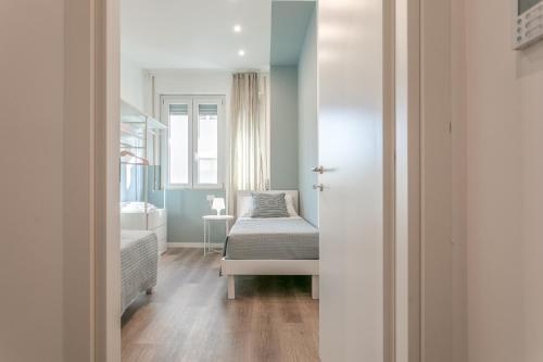 Katil atau katil-katil dalam bilik di Appartamenti nel Residence Grazia