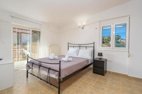 Katil atau katil-katil dalam bilik di Villa View - Athens Riviera with private pool