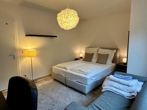 Ένα ή περισσότερα κρεβάτια σε δωμάτιο στο Gemütliche zentralgelegene 2 Zimmer Wohnung in Hamburg