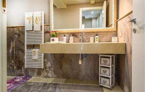 a bathroom with a sink and a mirror at Prato Bello in Fucecchio