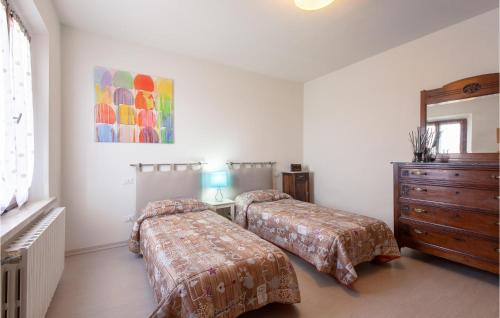 Ένα ή περισσότερα κρεβάτια σε δωμάτιο στο 3 Bedroom Awesome Apartment In Marti Pi