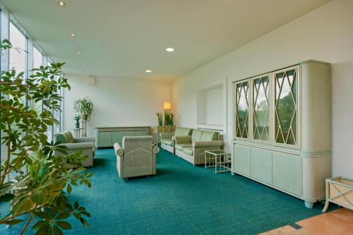 Zona de estar de TRIP INN Axxon Hotel