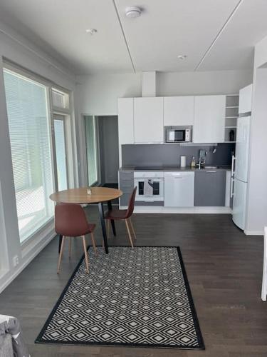 Una cocina o cocineta en Stylish spacious apartment in Tuusula