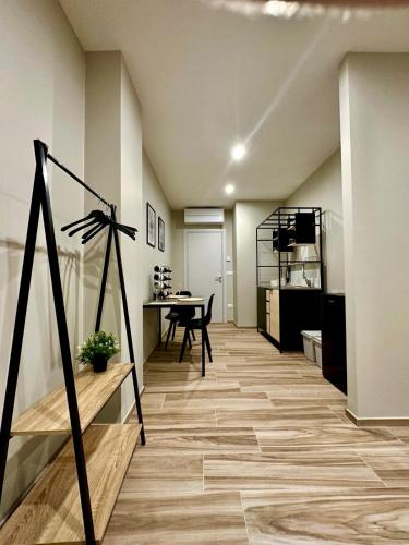Η κουζίνα ή μικρή κουζίνα στο Qualora Room & Suite