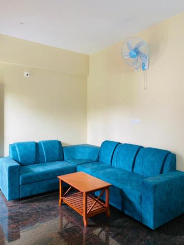 Zona de estar de O'live Inn Wayanad Apart-Hotels