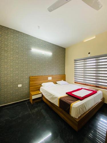 Cama o camas de una habitación en O'live Inn Wayanad Apart-Hotels