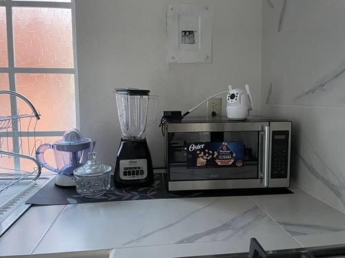Kuchyň nebo kuchyňský kout v ubytování Casa familiar para estar cómodos