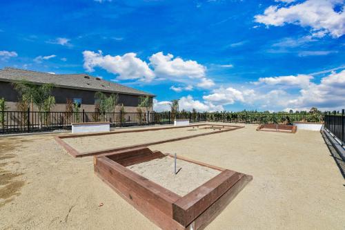 a skate park with a bunch of skateboards on it at Artigas in Lodi