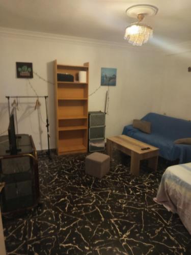 Posezení v ubytování Habitaciones cómodas