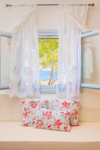 Starlight Luxury Seaside Villa & Suitesにあるベッド
