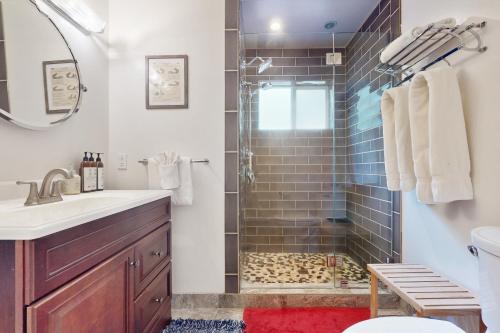 a bathroom with a shower and a sink at Carnelian Bay Paradise in Carnelian Bay