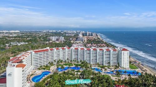 an aerial view of a resort and the ocean at Villamagna - Beachfront Retreat with Oceanviews in Nuevo Vallarta