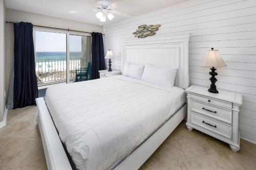Llit o llits en una habitació de Gulf Dunes 315