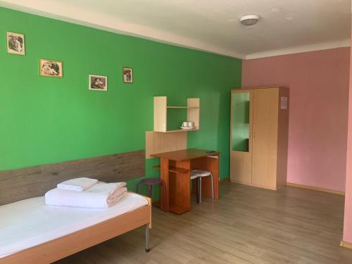 Postel nebo postele na pokoji v ubytování Podolski Hostel