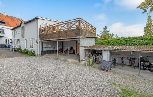 a building with bikes parked outside of it at Two-Bedroom Apartment Stege 0 03 in Stege