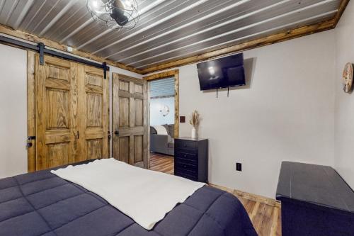 Postel nebo postele na pokoji v ubytování Cattie Shack