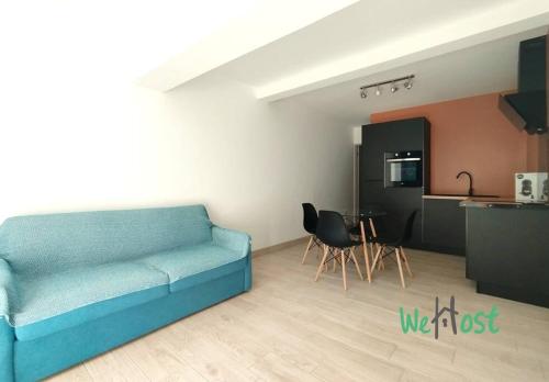 Kuchyň nebo kuchyňský kout v ubytování Le Frangipanier - Appartement tout confort