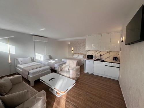 Kuchyň nebo kuchyňský kout v ubytování Treva Hotel & Apartaments