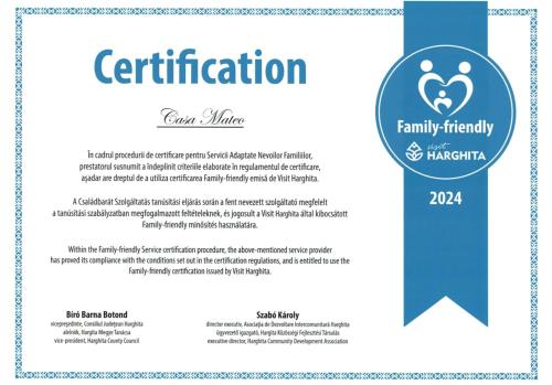 a brochure for a fertility clinic with a blue ribbon at Casa MATEO in Topliţa