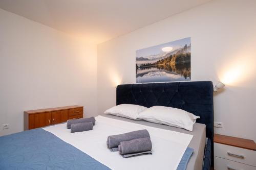 Postel nebo postele na pokoji v ubytování Apartment Dalmatino