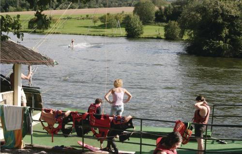 a group of people on a boat in the water at Ferienhaus 44 In Kirchheim in Kemmerode