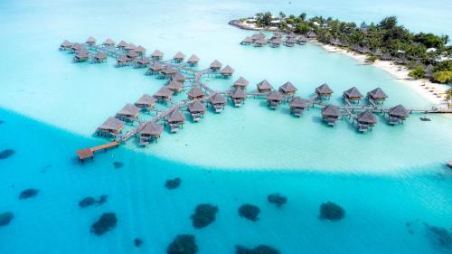 an aerial view of a resort island in the ocean at InterContinental Bora Bora Le Moana Resort by IHG in Bora Bora
