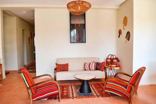 Zona de estar de Domaine Homa Marrakech