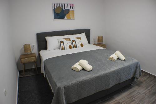 Ένα ή περισσότερα κρεβάτια σε δωμάτιο στο Sky Garden