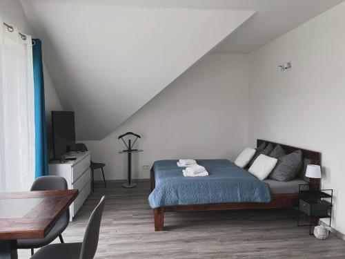 Postel nebo postele na pokoji v ubytování Apartmány u Romany