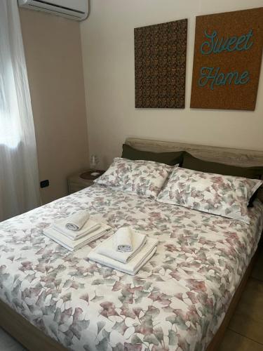 Letto o letti in una camera di Sweet Home