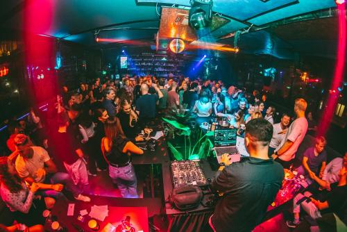 a crowd of people dancing in a club at Timeout Heritage Hotel Zagreb in Zagreb