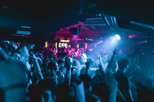 a crowd of people dancing at a nightclub at Timeout Heritage Hotel Zagreb in Zagreb
