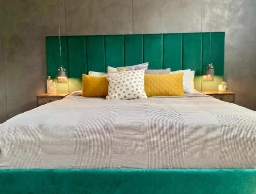 Ένα ή περισσότερα κρεβάτια σε δωμάτιο στο Apartament w centrum 65 m2