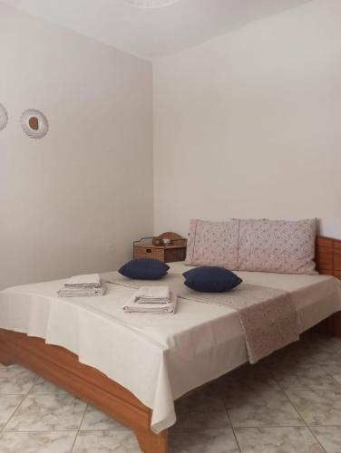 Ένα ή περισσότερα κρεβάτια σε δωμάτιο στο Sia Beach House
