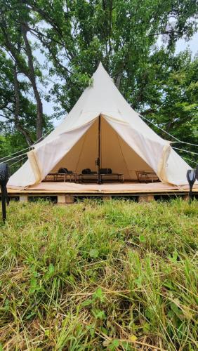 a large tent in the middle of a field at Karavani in Ambrolauri