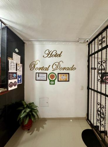 a hotel grand donde sign on a wall in a room at Hotel Portal Dorado in Marinilla