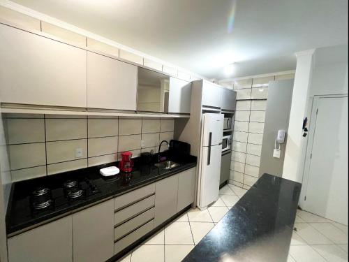 Imagen de la galería de Apartamento Pé na Areia em Itapema, en Itapema