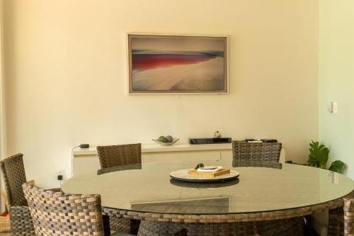 a dining room with a table and chairs at New Santa Fe Home Private Relaxation Realm in Xochitepec