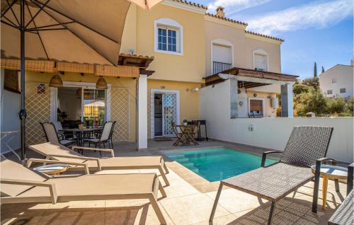 Πισίνα στο ή κοντά στο Cozy Home In Nerja With Kitchen