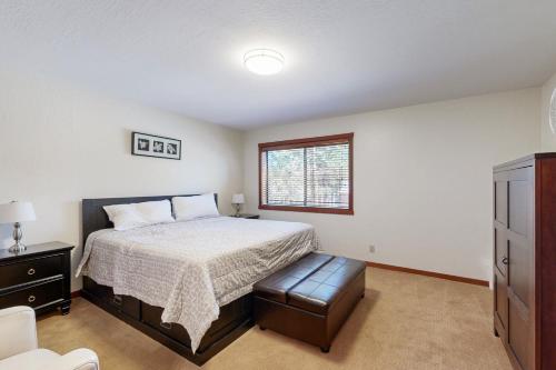 a bedroom with a bed and a window at Amazing Dollar Point Retreat in Tahoe City