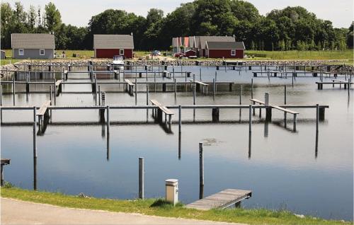 a bunch of docks in a body of water at 2 Bedroom Lovely Home In Zerpenschleuse in Zerpenschleuse