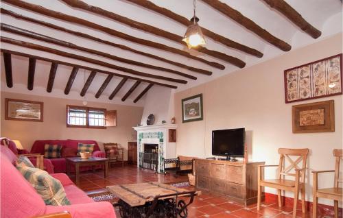 A television and/or entertainment centre at Gorgeous Home In Archidona