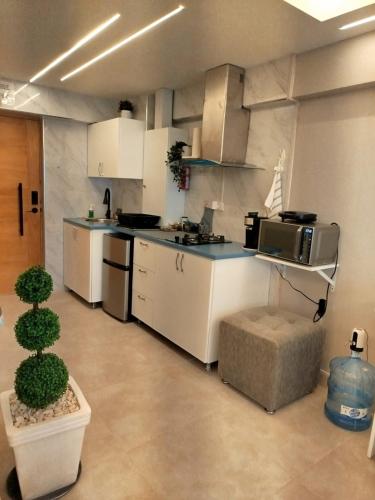 Η κουζίνα ή μικρή κουζίνα στο Mar & Relax