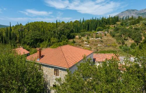 an overhead view of a house with an orange roof at Lovely Home In Gruda With Sauna in Gruda