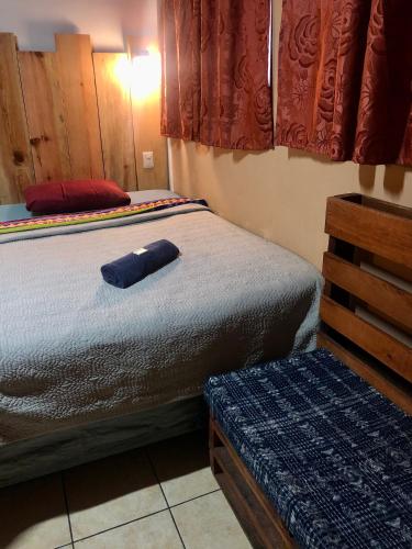 Una cama o camas en una habitación de Hostal Choja