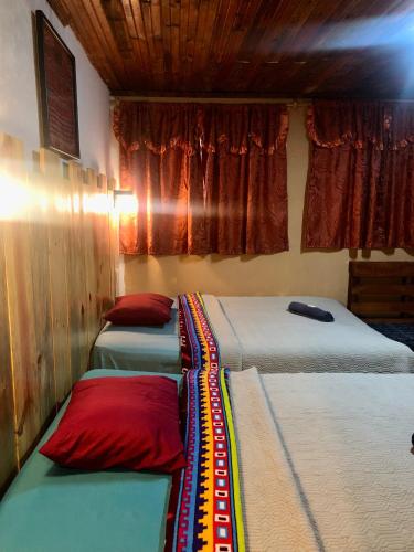 Una cama o camas en una habitación de Hostal Choja