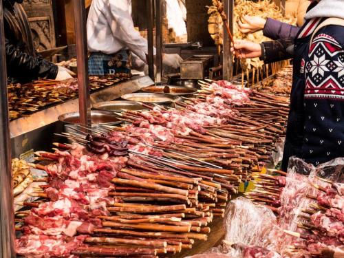 a row of meats on display in a market at Jinjiang Inn Xi'an Zhonglou North Street Metro Station in Xi'an