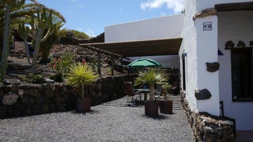 Un jardín fuera de Großes Ferienhaus in Guatiza mit Gemeinsamem Pool